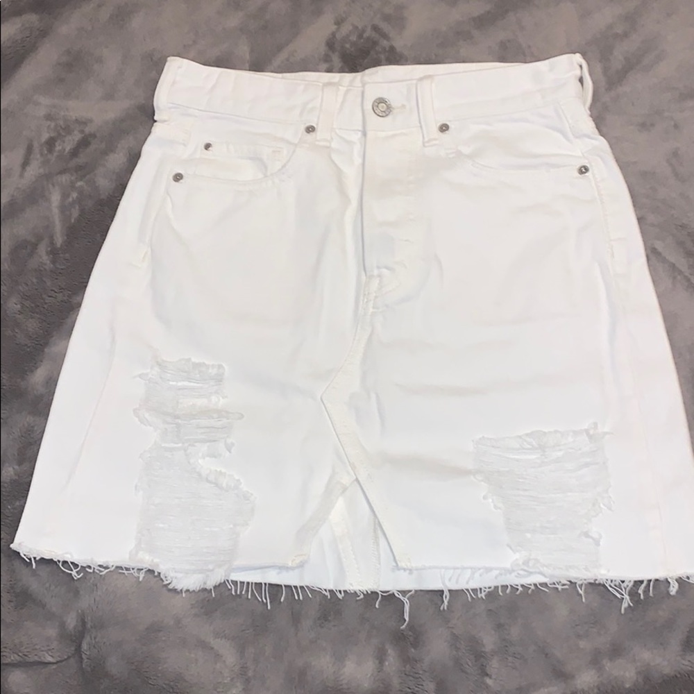 NWOT Distressed denim mini skirt
